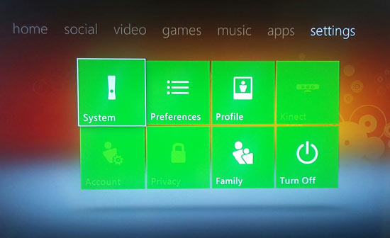 From the home screen, scroll to Settings on the top menu and select the System panel.
